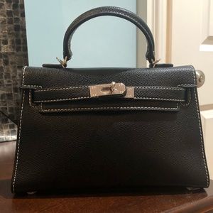 Mini black top handle bag